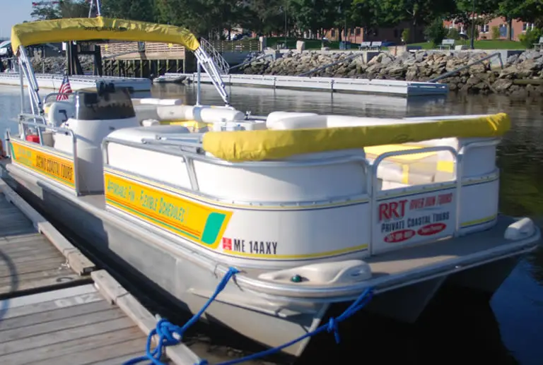 Pontoon boat tied at dock